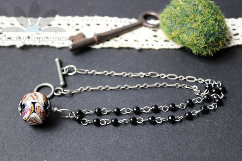 Simple Lampwork Necklace Handmade glass bead, neutral colors, rosary chain, black glass pearls antiqued silver chain, toggle clasp, simple image 4