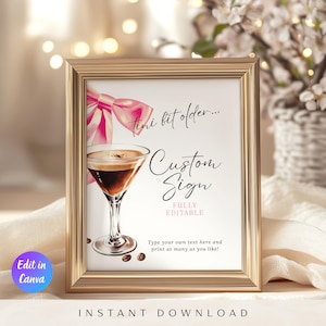 Puede incluir: Un marco dorado que contiene una impresión con una ilustración de un cóctel, un lazo rosa y el texto "tini bit older... Custom Sign". Las palabras "FULLY EDITABLE" e "INSTANT DOWNLOAD" también son visibles.