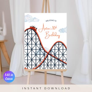 Puede incluir: Un letrero blanco sobre un caballete presenta un diseño de montaña rusa con el texto "Welcome to Anton's 10th Birthday". La montaña rusa es naranja y negra, con nubes azules de acuarela en el fondo. Las palabras "Instant Download" están en la parte inferior.