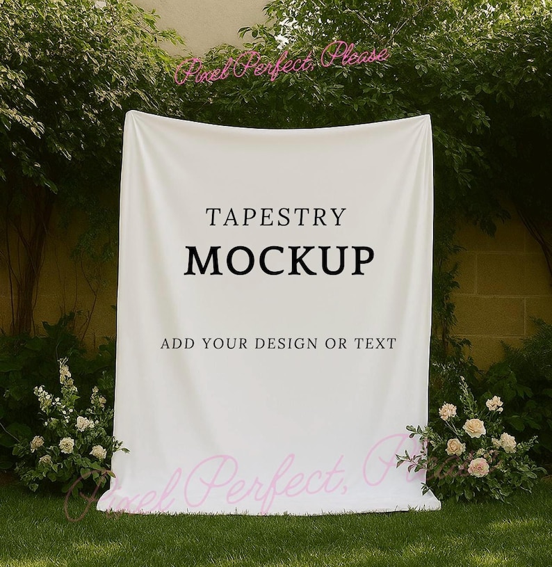 mockup of a white tapestry banner hanging near some trees and neuatful ivory flowers perfect to use for mockups that are selling tapestry backdrops or signs for weddings, bachelorette trips or bridal showers