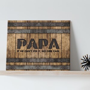 Each letter in the bold word PAPA includes the silhouette of a hand tool as part of the letter.  Beneath the word PAPA is the phrase “If he can’t fix it, no one can.” The background looks like aged vertical boards similar to a flattened oak barrel. At the top and bottom are aged metal strips. This is a perfect gift for anyone’s husband, dad, stepdad, grandpa, or favorite male friend who has tools and knows who to fix things. NOTE: This is a flat metal sign, not real wood or metal.