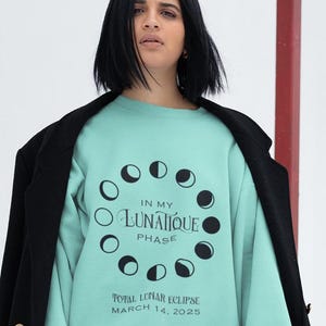 Lunar eclipse 2025 relaxed-fit, lightweight sweatshirt is made of super-soft cotton with moon-phase design.