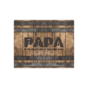 Each letter in the bold word PAPA includes the silhouette of a hand tool as part of the letter.  Beneath the word PAPA is the phrase “If he can’t fix it, no one can.” The background looks like aged vertical boards similar to a flattened oak barrel. At the top and bottom are aged metal strips. This is a perfect gift for anyone’s husband, dad, stepdad, grandpa, or favorite male friend who has tools and knows who to fix things. NOTE: This is a flat metal sign, not real wood or metal.