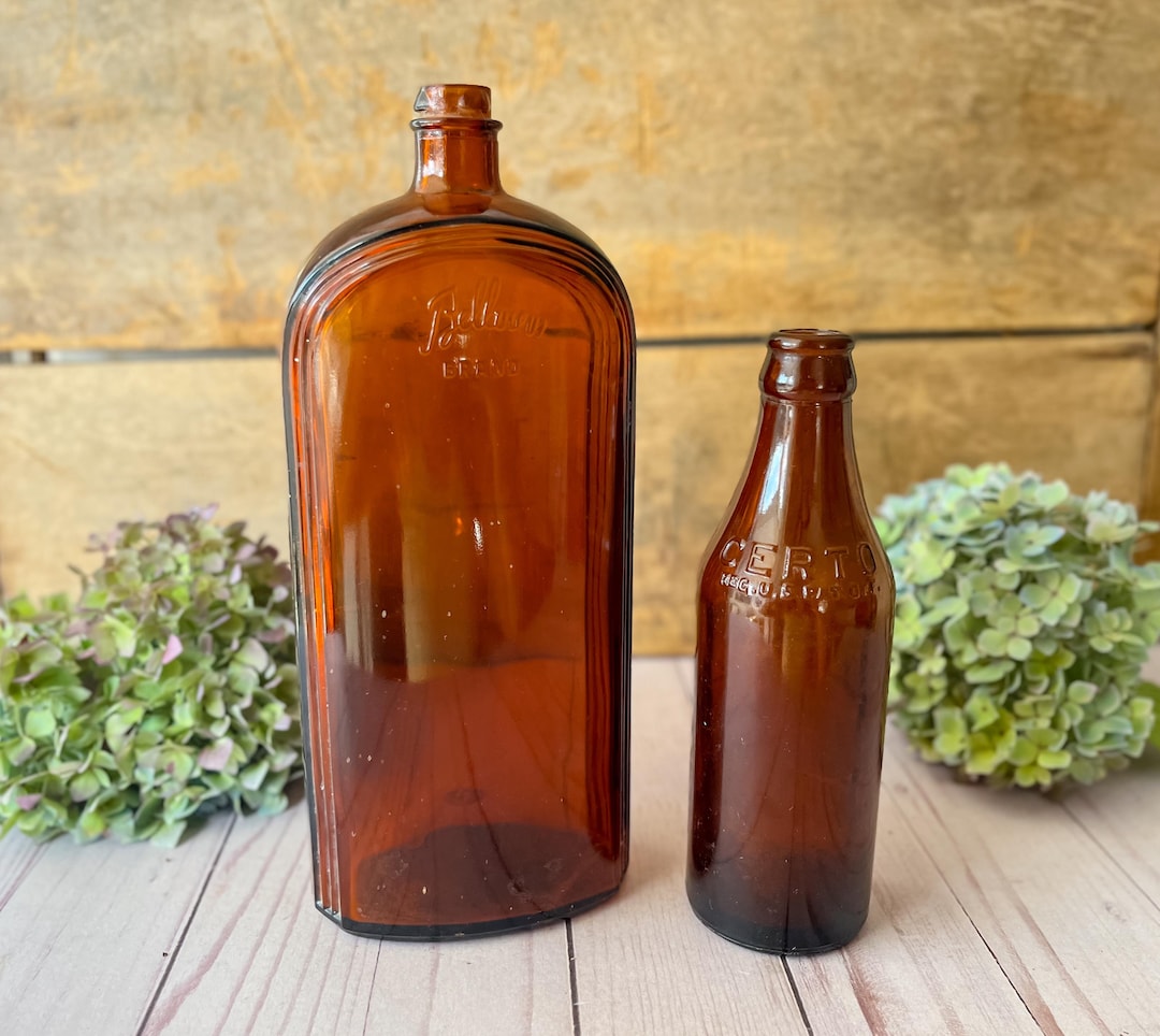 pair-of-vintage-amber-glass-bottles-etsy