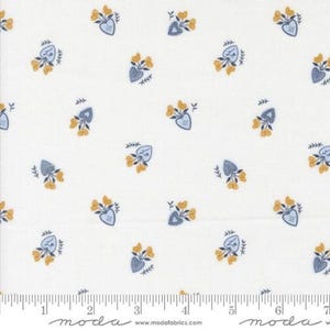 May include: White fabric with a repeating pattern of blue heart-shaped vases filled with yellow flowers. The fabric also features small green leaves and arrows. The pattern is evenly spaced across the fabric.