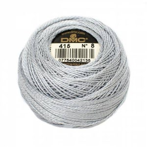 May include: A skein of DMC embroidery floss in color 415, a light gray. The skein is labeled with the DMC logo, the color number, and the thread size, which is 8.