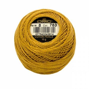 May include: A ball of DMC Perlé 8 cotton thread in a mustard yellow color. The label reads "Perlé 8 Col. 783" and "COTON PERLE 10 g". The thread is tightly wound, showing the texture of the yarn. Ideal for embroidery and other needlecraft projects.