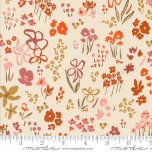 May include: A cream-colored fabric with a repeating pattern of pink, orange, and brown flowers. The flowers are stylized and abstract, with some resembling simple shapes and others with more intricate details. The fabric has a subtle texture and a soft, muted color palette.