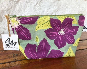 Medium size cotton zipper pouch purple clematis flowers on green