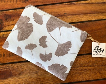 Gingko leaf pattern medium zipper pouch, purse organiser in beige on silver blue grey background