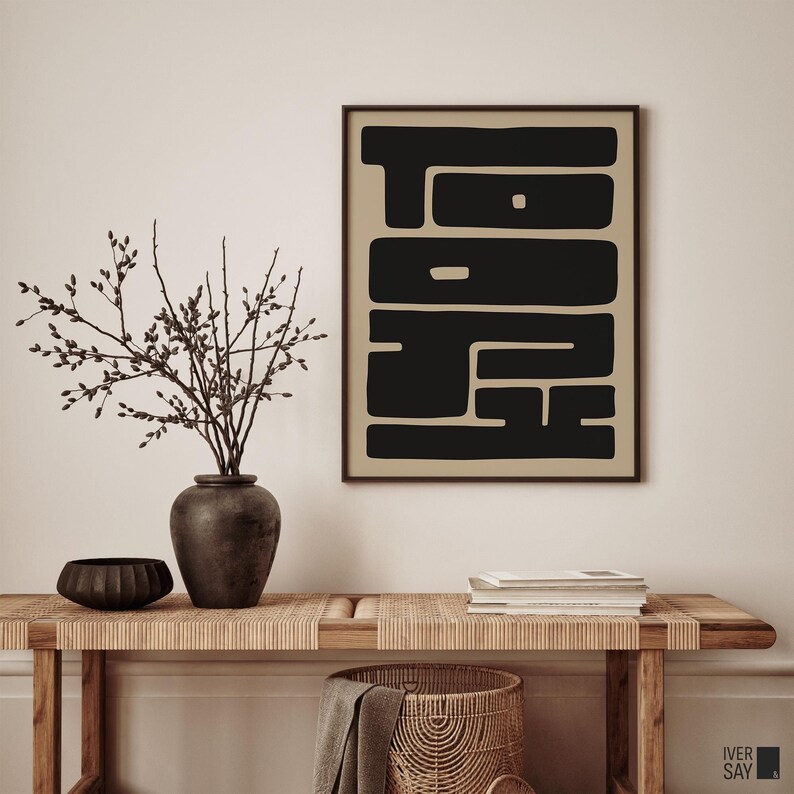Minimalist art print featuring the word “TOKYO” spelled out horizontally “TO” and vertically “KYO” in a bold, black font against a soft, neutral beige background.