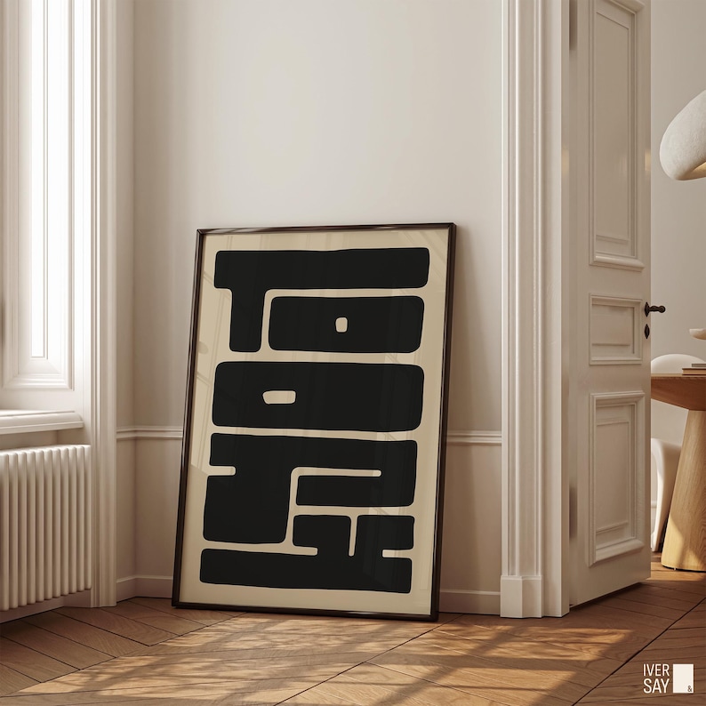 Modern graphic art print of “TOKYO” in a bold, geometric black font on a cream-colored background. Clean and minimalist design.
