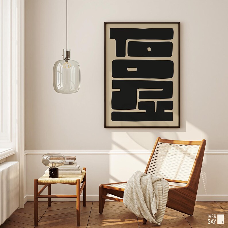 High-contrast black and beige art print of the word “TOKYO” in a bold, geometric design. Modern and striking wall art