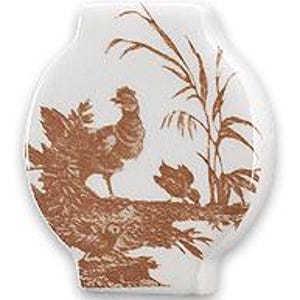 May include: White ceramic decorative vase with a brown rooster and plant design. The vase has a unique, rounded shape and a glossy finish. The rooster is standing on a branch, and the plant is to the right of the rooster.