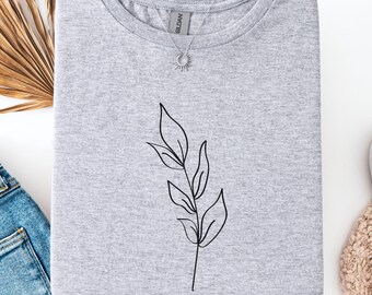 Camiseta con arte lineal botánico: Camiseta minimalista con gráfico de flores silvestres