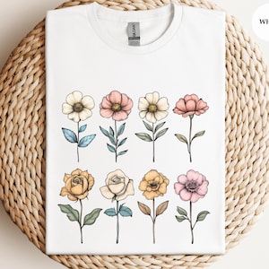 Floral Bliss T-Shirt, Botanischer Garten T-Shirt, Natur-Liebhaber-Shirt, Blumen-Thema Top, Frühlingsblüten-Kleidung