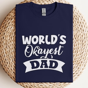 World Okayest Dad Shirt, Funny Sarcastic Text Design, Humor Gift for Dad, Father&#39;s Day Tee, Cool Chill Dad Joke T-shirt