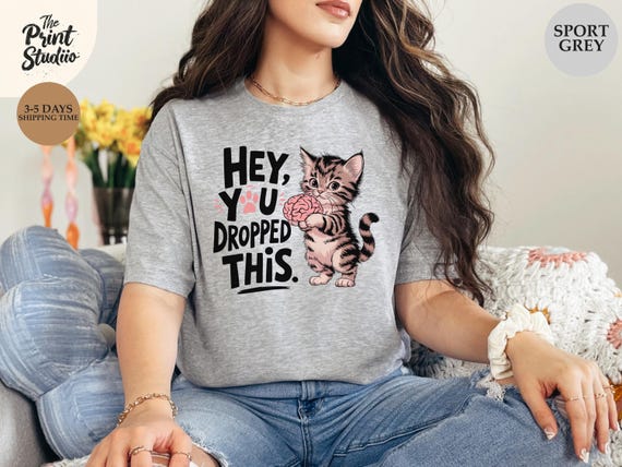 Hey You Dropped This T-Shirt, Cute Cat Graphic Tee, Funny Kitty Humor Shirt, Adorable Cat Lover Apparel, Playful Feline Gift