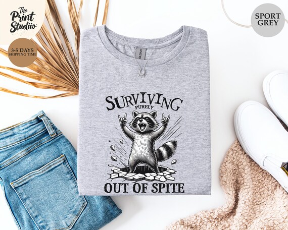 Surviving Purily Out of Spite Shirt Raccoon Funny Tee, Custom Color Design, Sarcastic Animal Graphic T-Shirt, Edgy Humor Top for Women