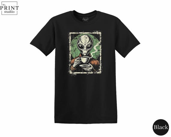 Alien Drinking Coffee Shirt, Funny UFO Caffeine Tee, Outer Space Coffee Lover Gift, Quirky Barista T-Shirt, Sci-Fi Coffee Graphic Tee