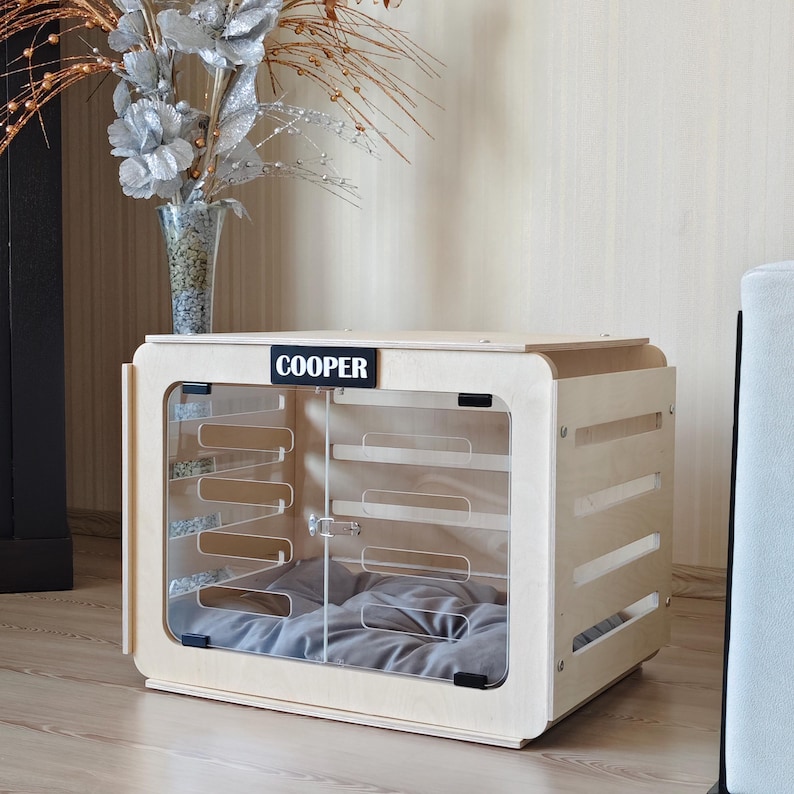 Side view of a birch plywood dog crate furniture showing smooth edges, ventilation slots, and solid wooden construction for indoor use.