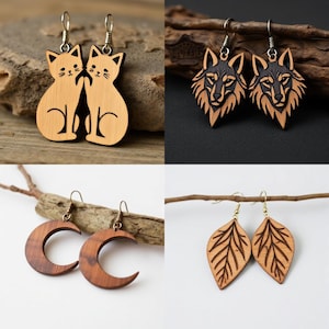 May include: A collection of wooden earrings featuring various designs. The earrings include cat silhouettes, wolf faces, crescent moons, and leaf shapes. Each pair has a unique design and is crafted from light and dark brown wood.