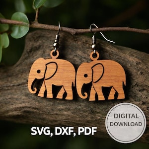 May include: Wooden elephant earrings with a natural wood grain finish. The earrings are hanging from silver-colored hooks. The image also includes the text "SVG, DXF, PDF" and a "DIGITAL DOWNLOAD" badge.