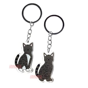 Cypers Kat Sleutelhanger | Cartoon Kitten Ras Bedel | Cute Kawaii Dieren Kado | Acrylic Dubbelzijdige Hanger Cadeau