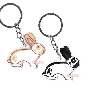 Lotharinger Konijn Sleutelhanger | Cartoon Konijn Ras Bedel | Cute Kawaii Dieren Kado | Acrylic Dubbelzijdige Hanger Cadeau