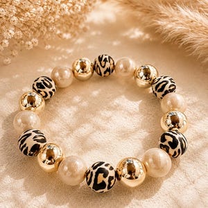 MAGIC JEWELS • Leopard print bracelets with luminous and reflective 12mm pearls • Handmade, all colors • Customizable