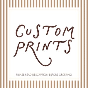 May include: A white background with brown vertical stripes and a white square in the center. The words "CUSTOM PRINTS" are written in brown cursive script. Below the text is the phrase "PLEASE READ DESCRIPTION BEFORE ORDERING."