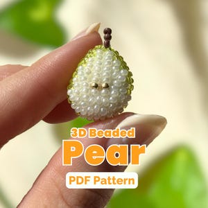 May include: A small 3D pear ornament crafted from tiny beads. The pear features a white beaded center, a light green beaded outer edge, and a dark brown beaded stem. The text 3D Beaded Pear PDF Pattern is overlaid on the image in white and orange.