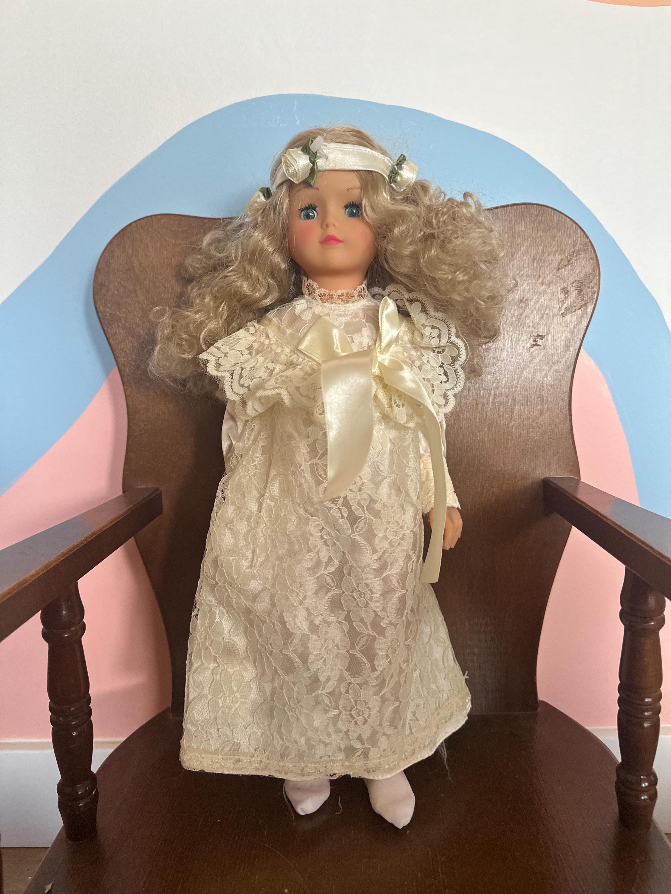 Vintage porcelain doll . great condition