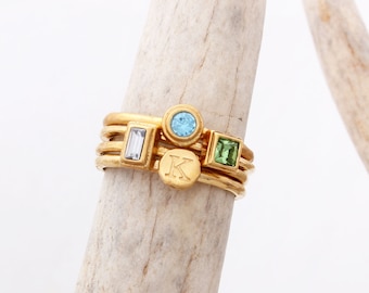 Gold Vermeil Initial Ring Set: Personalized Birthstone Stacking Rings. This ring is 1 initial and 3 birthstone rings.