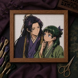 May include: A cross-stitch embroidery in a wooden frame depicting two anime-style characters. One character has long dark hair and wears a purple robe, while the other has green hair, a purple hair accessory, and a green robe, looking upward.