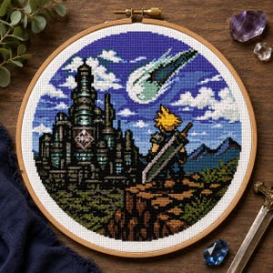 May include: A circular cross-stitch embroidery in a wooden hoop depicting a pixelated scene with a spiky-haired figure carrying a large sword, standing on a cliff overlooking a dark industrial city under a blue sky with a glowing green meteor.