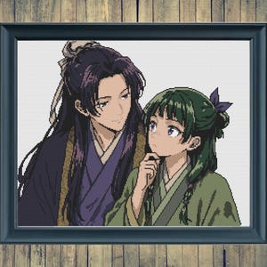 May include: Framed anime art print featuring two characters. A person with long black hair and a purple robe looks at a person with green hair and a green robe. The art is in a black frame.