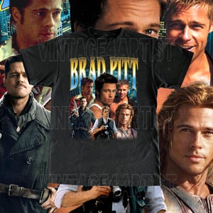 Könnte beinhalten: Schwarzes T-Shirt mit einem Vintage-Grafikdruck von Brad Pitts Gesicht aus verschiedenen Filmen. Der Text "Brad Pitt" ist in gelben und blauen Buchstaben gedruckt.