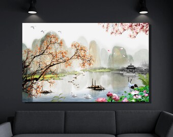 May include: A watercolour painting depicting a tranquil scene with mountains, a lake, and a small pavilion. The painting features a delicate pink and white floral motif in the top right corner, and a vibrant orange and yellow tree in the foreground. The lake is surrounded by lush green foliage and the mountains are painted in soft shades of blue and grey.