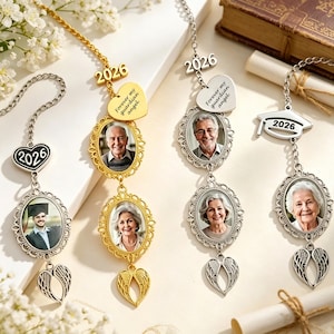 May include: Photo pendants with the year 2026, featuring oval frames with portraits, heart-shaped charms with the text "Forever my guardian angel," and wing charms. The pendants are in gold and silver tones, with a graduation cap charm.