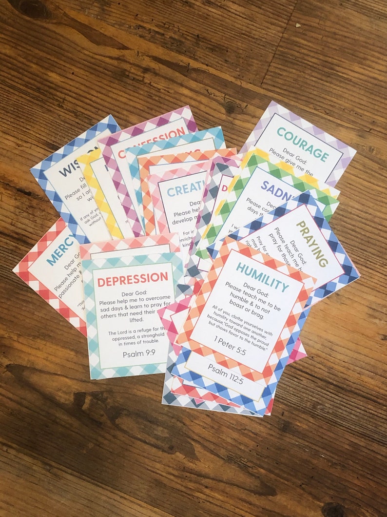 May include: A set of colorful cards with different words and bible verses on them. The words include: Mercy, Wisdom, Confession, Creation, Depression, Courage, Sadness, Praying, Humility.