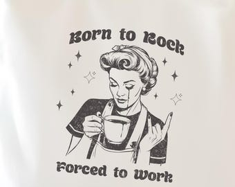 May include: White tote bag with a black and white illustration of a woman holding a coffee cup. The text on the bag reads "Born to Rock Forced to Work."