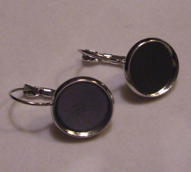 12 pairs silver tone lever back earrings with bezel image 2