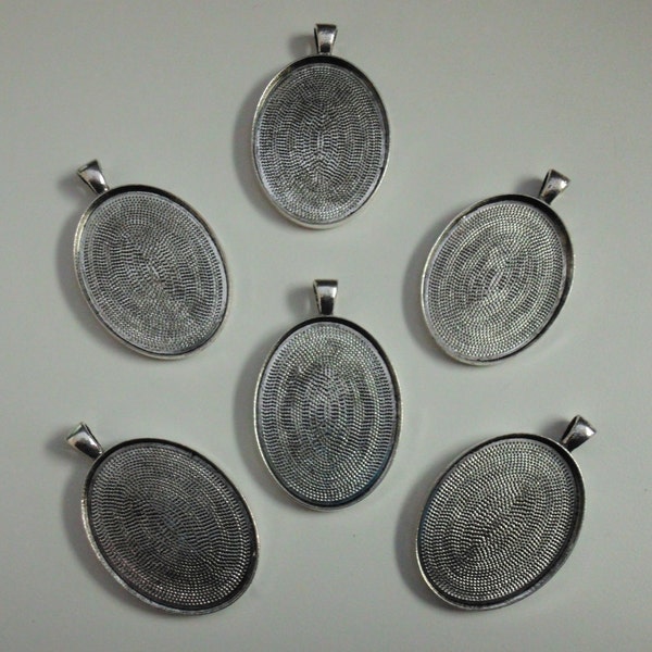 12 pendentifs argentés antiques avec de la colle 40x30 dans les réglages