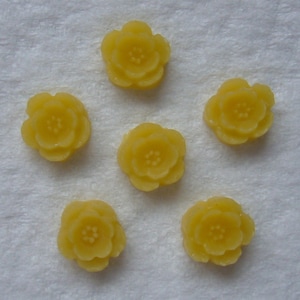 12 yellow 9mm flower cabs