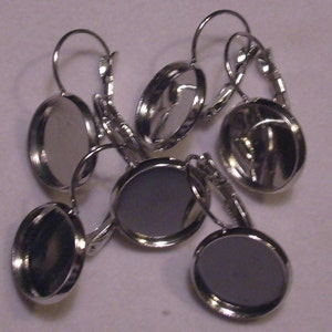 12 pairs silver tone lever back earrings with bezel image 1