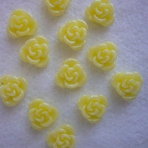 1 dozen 8mm glittery yellow flower cabochons