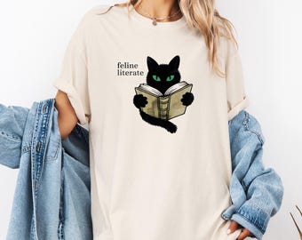 Katzen-Weinlese-T-Shirt, lustiges Buch-T-Stück, katzenartige gebildete, weiße Unisexkomfort-Farben T-Shirt