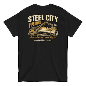 May include: Black t-shirt with a graphic featuring a construction vehicle lifting a large pipe. The text "STEEL CITY PIPE RUNNERS" is above the image, with "Built Strong, Laid Right!" and a phone number below.