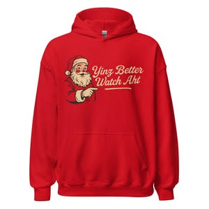 May include: A red hoodie with a Santa Claus graphic pointing to the text "Yinz Better Watch Aht". The Santa illustration has a white beard and a red hat. The sweatshirt has a front pocket and a drawstring hood. The text is in a vintage style.